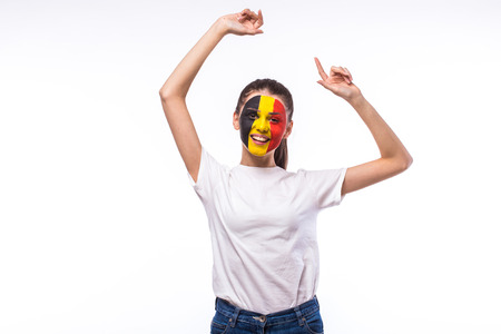 Victory, happy and goal scream emotions of Belgian football fan in game support of Belgium national team on white background. European football fans concept.の写真素材