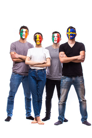 Group of football fans support their national team: Belgium, Italy, Republic of Ireland, Sweden at camera on white background. European football fans concept.の写真素材