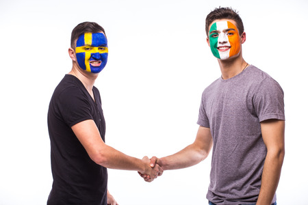Sweden vs Republic of Ireland handshake of equal game on white background. European  football fans concept.の写真素材