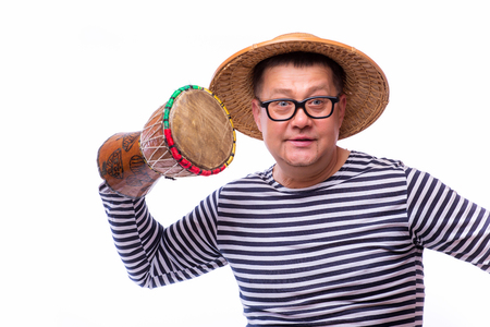 Old year singer dress like sailor with drum on white backgroundの写真素材