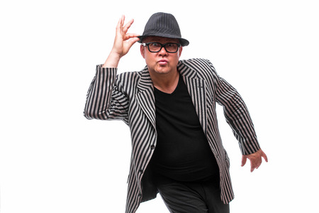 Handsome man in suit demonstrate different gesture on white backgroundの写真素材