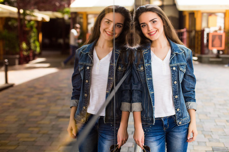 Young girl on summer city streetsの写真素材