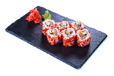 Sushi Set nigiri and sushi rolls on black stone slate. Restaurant food concept.の写真素材