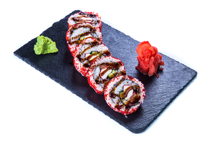 Sushi Set and sushi rolls on black stone slate. Restaurant food concept.の写真素材
