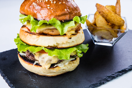 Tasty grilled  burger. Restaurant food concept.の写真素材