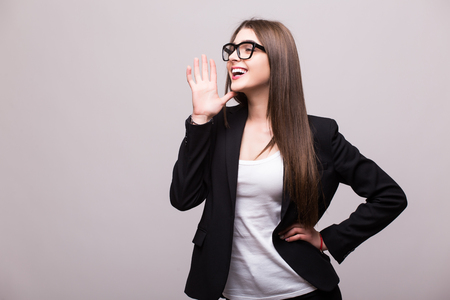 Business woman scream on white backgroundの写真素材