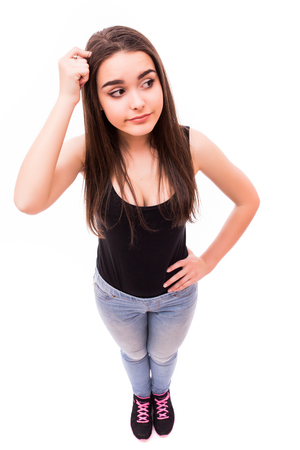 Thinking girl from above on white backgroundの写真素材