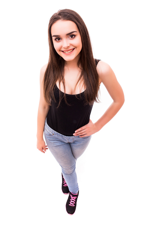 Smile girl posing on white from aboveの写真素材