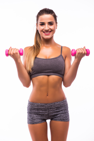 Woman exercising with dumbbellsの写真素材