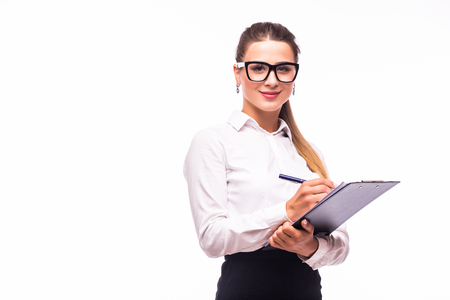 Business woman writing a note.の写真素材