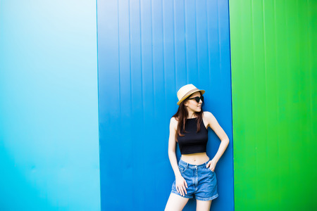 Summer girl over colorfull backgroundの写真素材