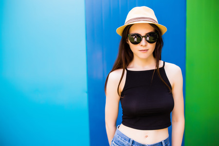 Summer girl over colorfull backgroundの写真素材