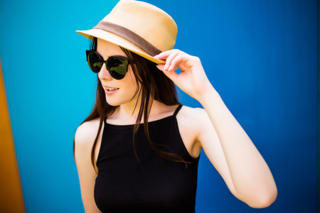 Summer girl over colorfull backgroundの写真素材