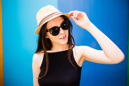 Summer girl over colorfull backgroundの写真素材