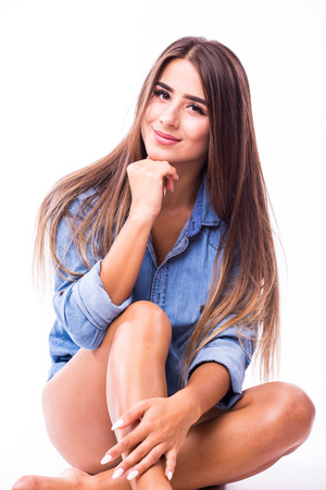 Portrait of young girl looking and posing on cameraの写真素材