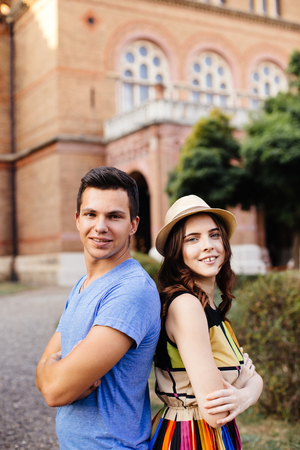 Young love couple walking in the city streetsの写真素材