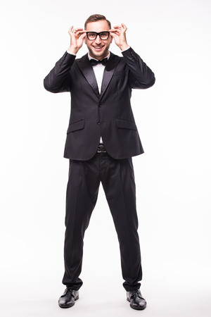 Handsome man in glasses over grey backgroundの写真素材