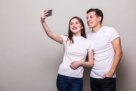 Young couple take selfie