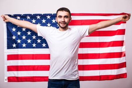 Young handsome man with american flag. Patriot.の写真素材