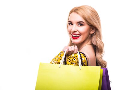 Beautiful young women with bags, shopping concept, isolated on white backgroundの写真素材
