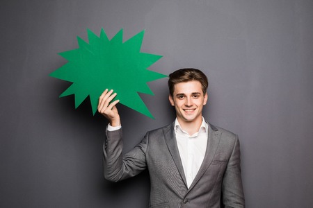 Man holding white blank speech bubble with space for textの写真素材