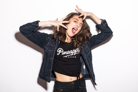 Style hipster woman portrait with face emotions on whiteの写真素材