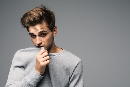 Elegant young handsome man. Studio fashion portrait.の写真素材