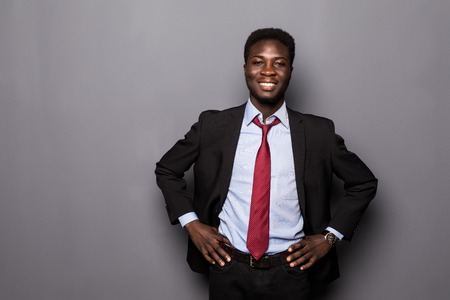 Portrait of a successful confident african businessman professional in a smart formal suit