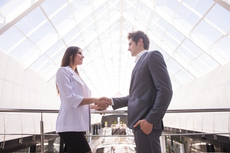 Close-up of shaking hands after a business meeting in the officeの写真素材