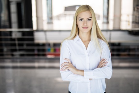 A portrait of a young business woman in an officeの写真素材
