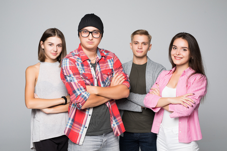 Four frineds young people on isolated on whiteの写真素材