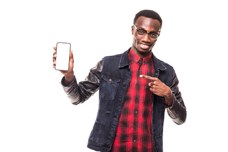 Young African American man pointing his smartphone screen - Black teenager peopleの写真素材