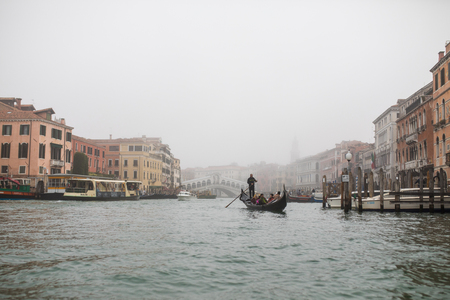 Venice, Italy - October, 2017: View from water canal to old buildings in Venice, Italy the street in the old center.のeditorial素材