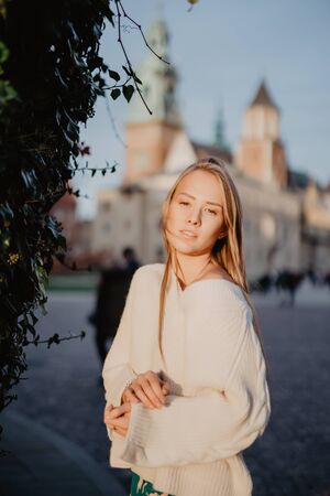 Young stylish woman in a city streetの写真素材