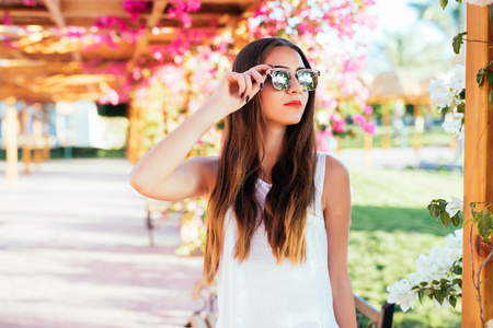 Beautiful woman relaxing at the summer beachの写真素材