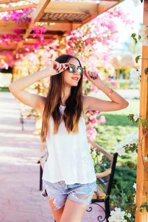 Beautiful woman relaxing at the summer beachの写真素材