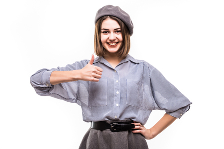 Jolly young French woman expressing approval on whiteの写真素材
