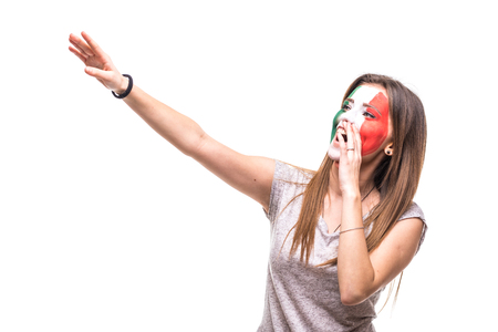 woman supporter fan of Mexico national team painted flag face get happy victory screaming pointed hand.の写真素材