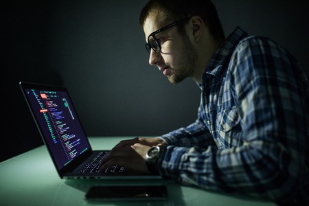 Hacker attack the server in the dark. Hacker attack network and servers, codec and virus.