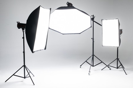 Photo studio interior with professional lighting equipmentの写真素材