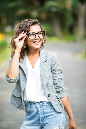 Young Woman with Glasses Out in the City - Beautiful young woman with glasses out in the cityの写真素材