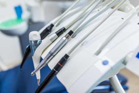 Different dental instruments and tools in a dentists officeの写真素材