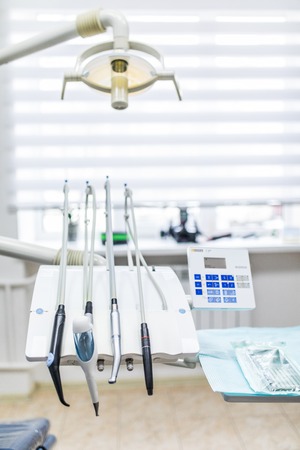Different dental instruments and tools in a dentists officeの写真素材