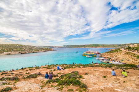 COMINO, MALTA - November, 2018: Holidays at Blue lagoon on island Comino, Malta