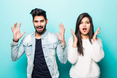 Young indian couple take selfie on green backgroundの写真素材