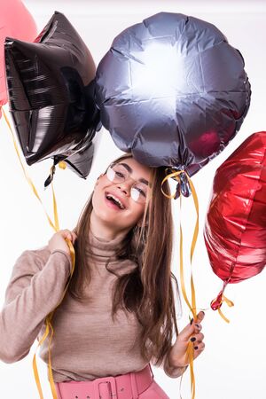 Attractive young woman with balloon on Valentine Dayの写真素材