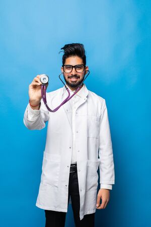 portrait of Indian young male medical worker. isolated on whiteの写真素材