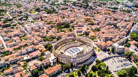 Pula aerial drone shot. The Arena is the only remaining Roman amphitheatre to have four side towers and with all three Roman architectural orders entirely preserved. It was constructed in 27 BC 68 ADの写真素材