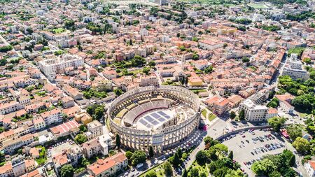 Pula aerial drone shot. The Arena is the only remaining Roman amphitheatre to have four side towers and with all three Roman architectural orders entirely preserved. It was constructed in 27 BC 68 ADの写真素材