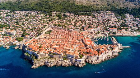 Dobrovnik, Croatia from above - Aerial drone footage of the historic city of Dubrovnik. City walls, blue sea and harbour.の写真素材